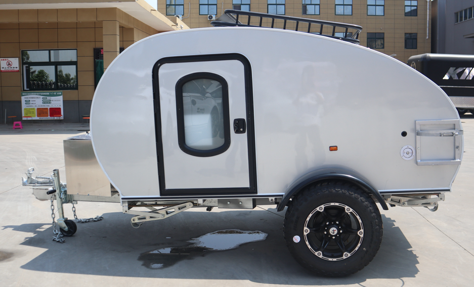 Side view of a lightweight teardrop camper trailer built in NSW